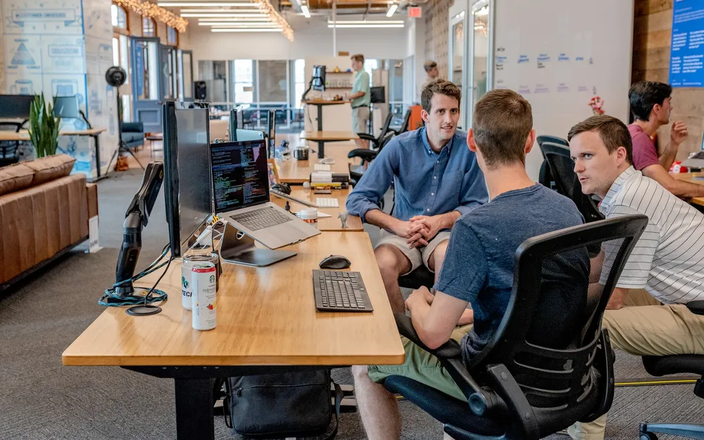 A team reviewing results together in an open office