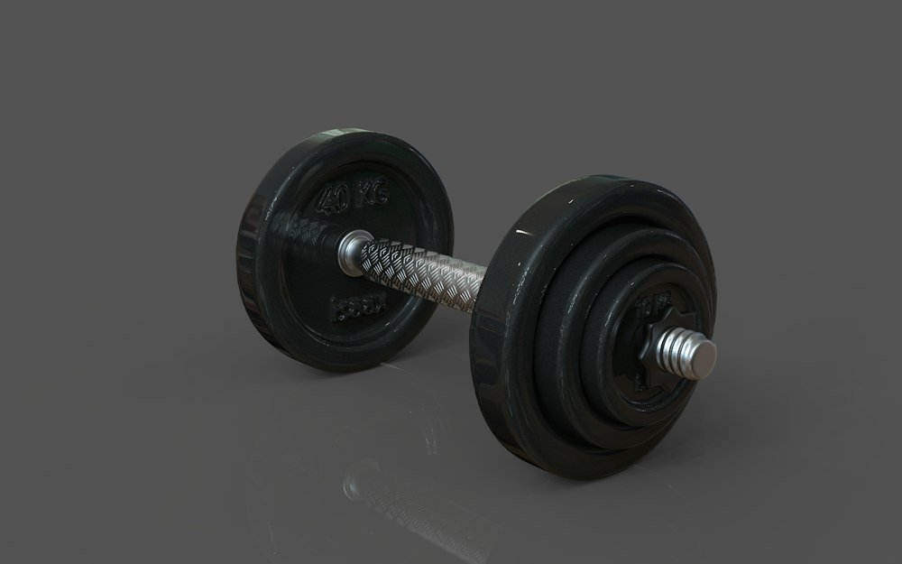 Single dumbbell on a grey surface